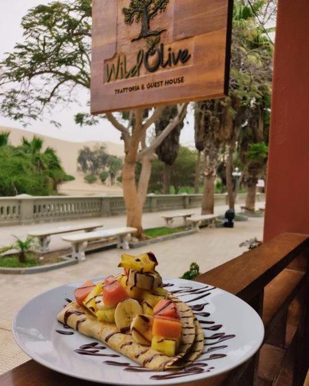 Wild Olive Guest House Ика Екстериор снимка